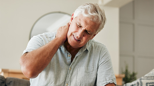 man with neck pain