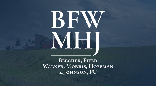 logo over Iowa farm background
