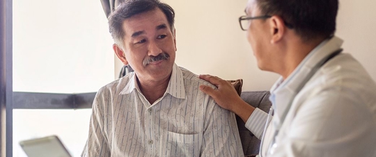 Person receiving an update from a medical professional.